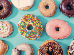 a grouping of yummy donuts