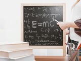 A representation of a board and books.