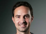 close up of smiling man with brown hair