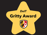 Gold star with the UMBC shield and the text DoIT Gritty Award